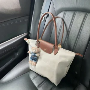 Long handled single shoulder handbag, Longxiang handbag, dumpling bag, crossbody bag, commuter women's bag. 1