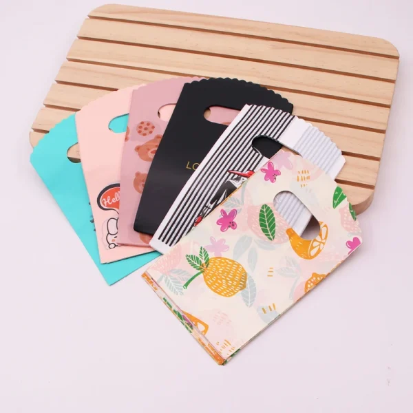 50Pcs/Lot Multi Designs Plastic Bags 9x15cm Mini Gift Bag Party Jewelry Nuts Candy Packaging Bags Nice Plastic Shopping Bag 1