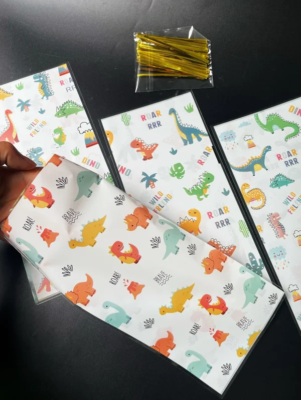 50pcs Cute Little Dinosaur Design Gift Candy Decorated OPP Flat Pocket With Gold Tie-in, Cartoon Animal Volcano Printed Gift Bag 3