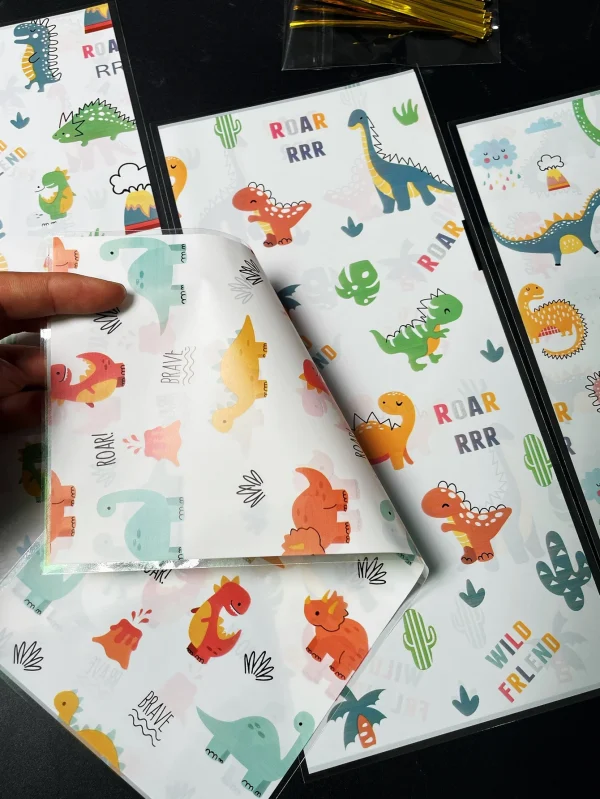 50pcs Cute Little Dinosaur Design Gift Candy Decorated OPP Flat Pocket With Gold Tie-in, Cartoon Animal Volcano Printed Gift Bag 5
