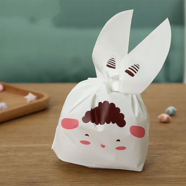 Special Price 50pcs 13.5x22cm Cute Rabbit Ear Plastic Bag Cookie Bags Christmas Gift Bags Candy Birthday Party Wedding Decorate 2