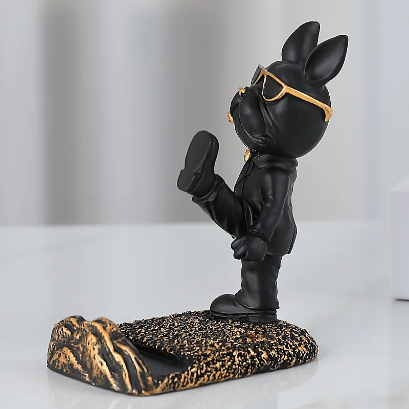 Black kicking dog